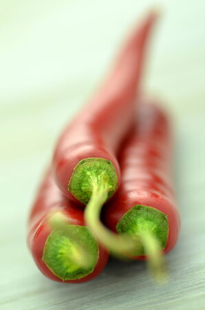 red hot chilli peppers on tableの写真素材