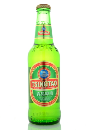 Tsingtao beer isolated on white backgroundのeditorial素材