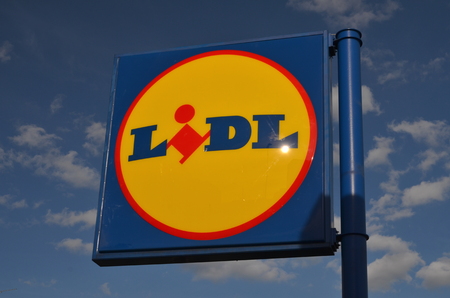 sign of Lidl against blue skyのeditorial素材