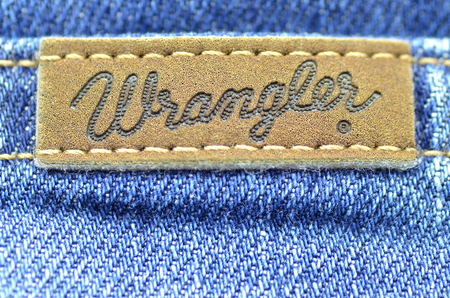 Closeup of Wrangler label on blue jeansのeditorial素材