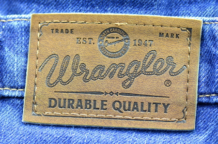 Closeup of Wrangler label on blue jeansのeditorial素材