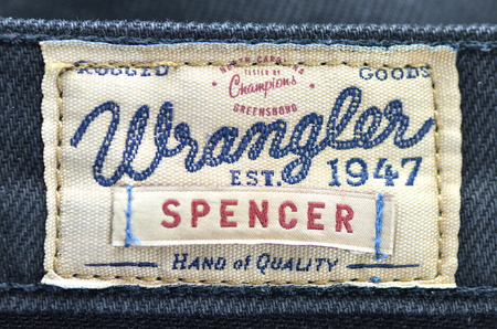 Closeup of Wrangler label on blue jeansのeditorial素材