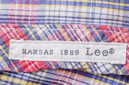 Closeup of Lee label on clothes. Lee is an American brand of denim jeans, first produced in 1889 in...