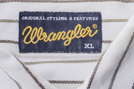 Closeup of Wrangler label on a shirt.