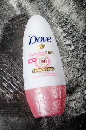 Dove anti-perspirant isolated on metal background. Dove is personal care brand owned by Unilever originating in the United Kingdom. Dove was introduced in 1955.のeditorial素材