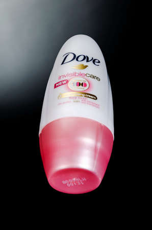 Dove anti-perspirant isolated on gradient background. Dove is personal care brand owned by Unilever originating in the United Kingdom. Dove was introduced in 1955.のeditorial素材