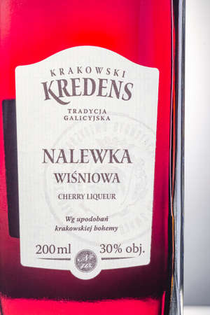 Krakowski Kredens cherry liqueur isolated on gradient background. Krakowski Kredens Tradycja Galicyjska is a premium food brand. It was established in 2007.のeditorial素材