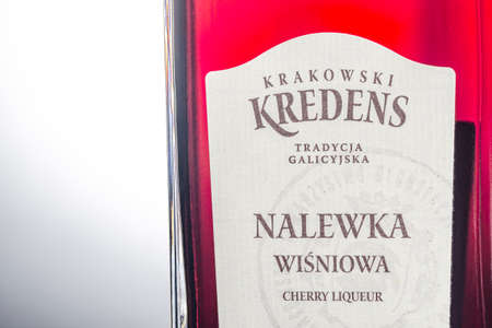 Krakowski Kredens cherry liqueur isolated on gradient background. Krakowski Kredens Tradycja Galicyjska is a premium food brand. It was established in 2007.のeditorial素材