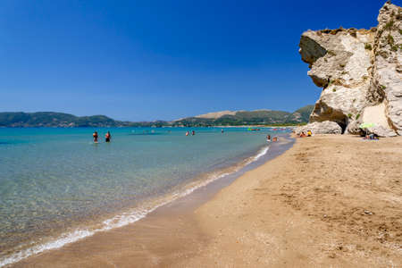 Picturesque sandy beach in Kalamaki situated on Laganas bay of Zakynthos island on Ionian Sea, Greece.のeditorial素材