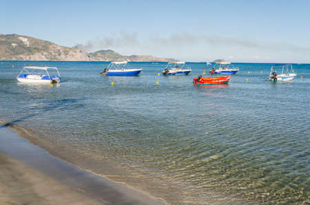 Picturesque golden sandy beach in Laganas situated on Laganas bay of Zakynthos island on Ionian Sea, Greece.のeditorial素材
