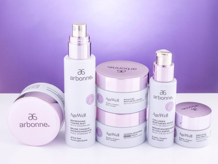 Arbonne age well cosmetics isolated on gradient background. Arbonne is international multi-level marketing company founded in 1980 in the United States by Norwegian entrepreneur Petter Morck.のeditorial素材