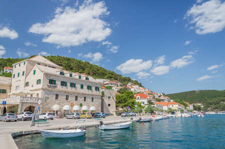 Picturesque bay of Pucisca. Pucisca lies at the end of deep natural bay on the northern coast of...