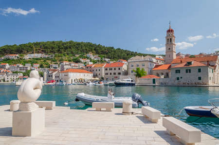 Picturesque bay of Pucisca. Pucisca lies at the end of deep natural bay on the northern coast of...