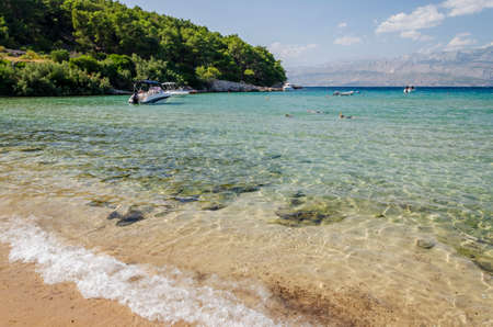 Picturesque sandy beach of Lovrecina on the northern coast of Brac island in Croatia.