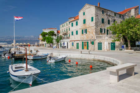 Picturesque bay and the old town of Postira. Postira lies on the northern coast of Brac island in Croatia.のeditorial素材