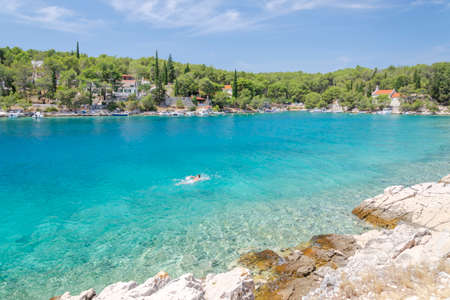 Idyllic Osibova bay with rocky beach nearby Milna on the west coast of Brac island in Croatiaの写真素材