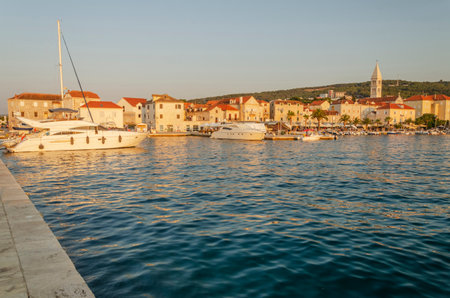 Picturesque old town of Supetar in sunset light. Supetar is the biggest town of Brac island in Croatiaの写真素材