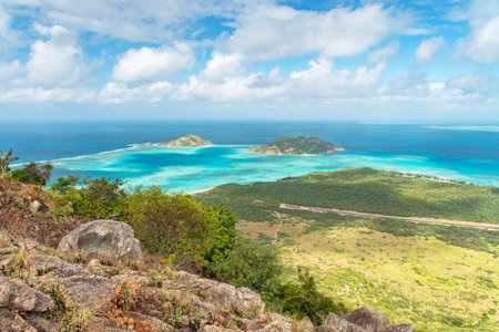 Spectacular aerial view of coral reefs from Cooks Look on Lizard Island. It is located on Great...