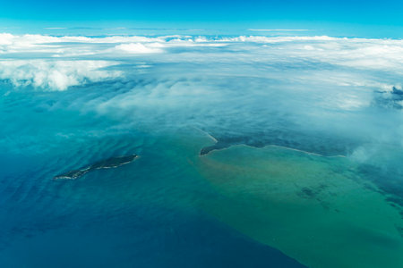 Spectacular aerial view on Great Barrier Reef on the way from Cairns to Lizard Island, Queensland, Australia. Great Barrier Reef is the worlds largest coral reef system.の写真素材