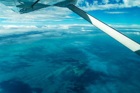 Spectacular aerial view on Great Barrier Reef on the way from Cairns to Lizard Island, Queensland, Australia. Great Barrier Reef is the worlds largest coral reef system.の写真素材