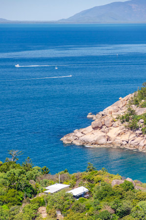 Picturesque golden sandy Alma Beach with granite boulders and turquoise water on Magnetic Island, Queensland, Australia. It is a holiday destination 8 km offshore of Townsville.の写真素材