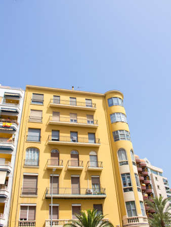 Alicante, Spain; June 30, 2020; Alicante's delegation on a summer day with people walking down the streetの写真素材