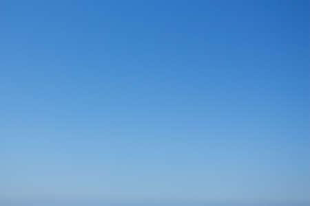 A blue abstract background, the sky on a sunny dayの写真素材