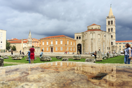 ZADAR, CROATIA - AUGUST 17, 2015: Church of St. Donat and forum in Zadar, Croatia. The Church was built in the 9th century and it's example of Byzantine architecture in Dalmatia.のeditorial素材