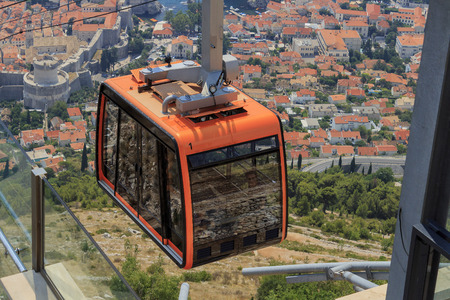 DUBROVNIK, CROATIA - AUGUST 13, 2015: Tourists at Cable car which connects Dubrovnik and mountain Srdj above town.のeditorial素材