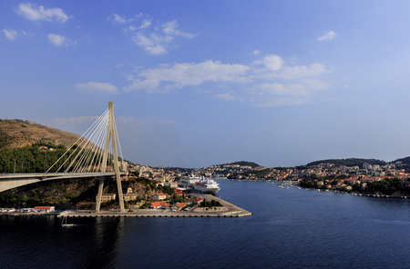 The Franjo Tudman Bridge, and the port of Gruz, with cruiser, passenger ships and other vessels, in Dubrovnik, Croatiaのeditorial素材