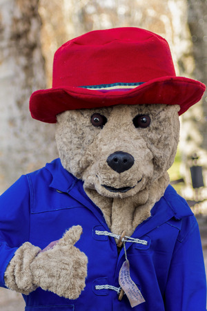 ZAGREB, CROATIA - DECEMBER 13, 2014: Advent in Zagreb, Croatia. Man in bear costume entertaining visitors of Advent in Zagrebのeditorial素材