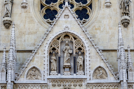 Jesus sculpture over the Zagreb cathedral entranceの写真素材
