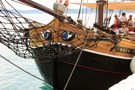 ZADAR, CROATIA - JULY 15, 2014: Wooden tourist ship anchored in the harbor waiting for tourists to come aboardのeditorial素材