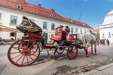 ZAGREB, CROATIA - MAY 07, 2016: Tourist attraction dual horse carriage in upper town in Zagreb,...