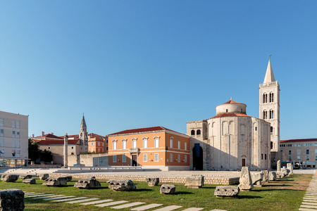 St. Donat church and Cathedral of St. Anastasia bell tower in Zadar Roman forum, Croatiaのeditorial素材