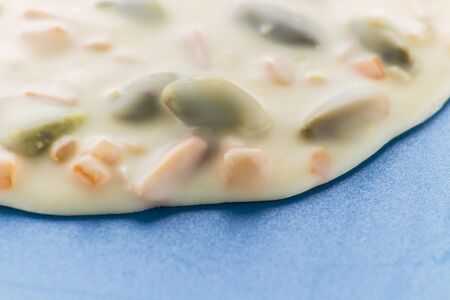 White chocolate with nuts and pistachio