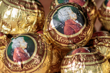 ZAGREB, CROATIA - OCTOBER 16, 2016: The Mozartkugeln, is a small, round sugar confection made of pistachio marzipan, and nougat, covered with dark chocolate. It was originally known as Mozart-Bonbonのeditorial素材