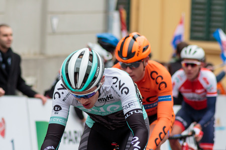 ZAGREB, CROATIA - APRIL 24, 2016: Bicycle race Tour of Croatia 2016. Three cyclist in the rowのeditorial素材