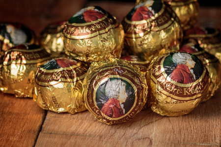 ZAGREB, CROATIA - OCTOBER 16, 2016: The Mozartkugeln, is a small, round sugar confection made of pistachio marzipan, and nougat, covered with dark chocolate. It was originally known as Mozart-Bonbonのeditorial素材