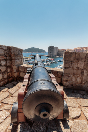Old Cannon used as defense system of Old Port of Dubrovnikの写真素材