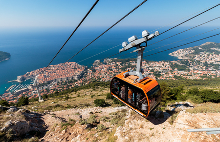 Dubrovnik Cable Car. View from the top of Mount Srdj. Old town city wall and the Adriatic sea in background.のeditorial素材