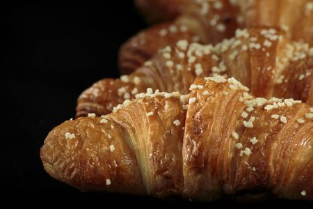 Croissant sprinkled with white chocolate