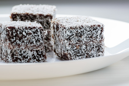 Australian Lamington cake on white plateの写真素材