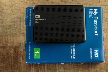 ZAGREB, CROATIA - JUNE 20, 2015: Western digital My Passport ultra 1 tb portable hard drive, powered...