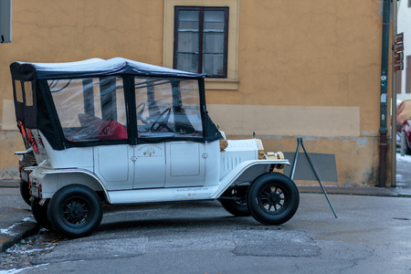 ZAGREB, CROATIA - JANUARY 08, 2017: Oldtimer sightseeing tour electric cars on Upper town of Zagreb. Tour is popular with tourists and locals.のeditorial素材