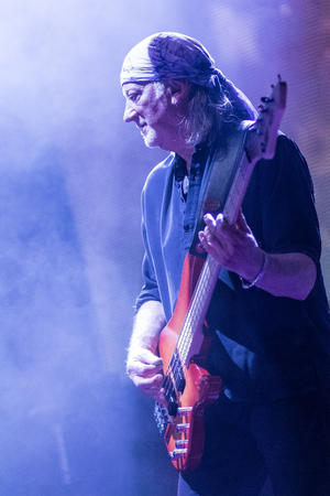 ZAGREB, CROATIA - MAY 16, 2017: Deep Purple bass guitar player Roger Glover in smoke on stage during...