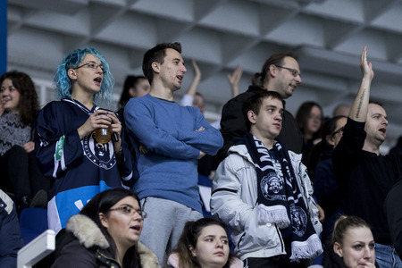 ZAGREB, CROATIA - DECEMBER 21, 2017: EBEL ice hockey league match between Medvescak Zagreb and Dornbirn. Blue hair colored Medvescak fanのeditorial素材