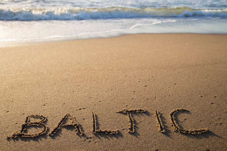 Inscription on the sandの写真素材