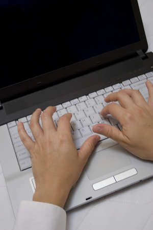 Close up of woman typing 