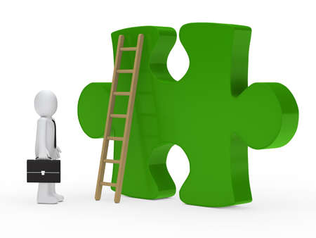 Businessman stand for a big green puzzleの写真素材